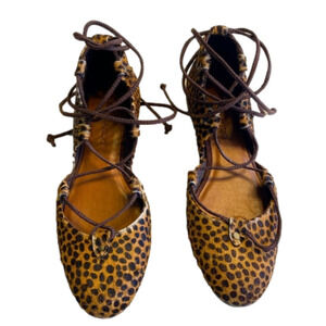 Womens pre-owned wrap around ankle leopard print flats size 6​